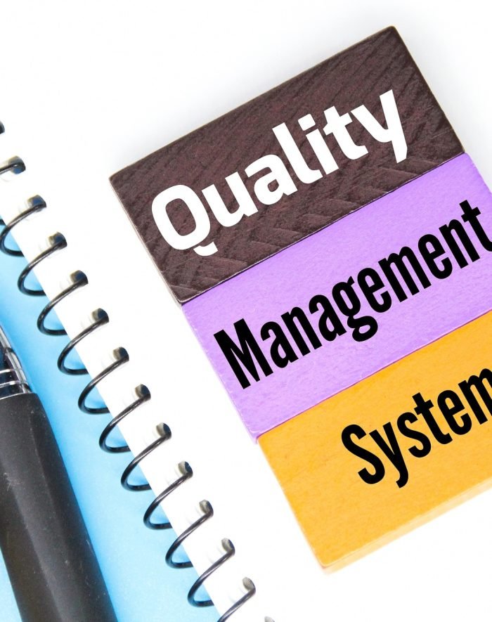colored-cubes-pens-and-words-quality-management-system